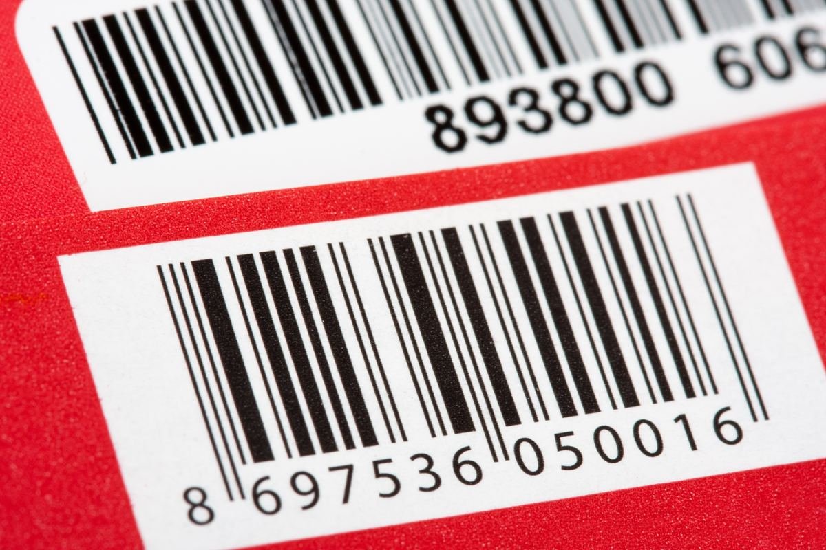 Macro shot of barcodes and product numbers on red packaging